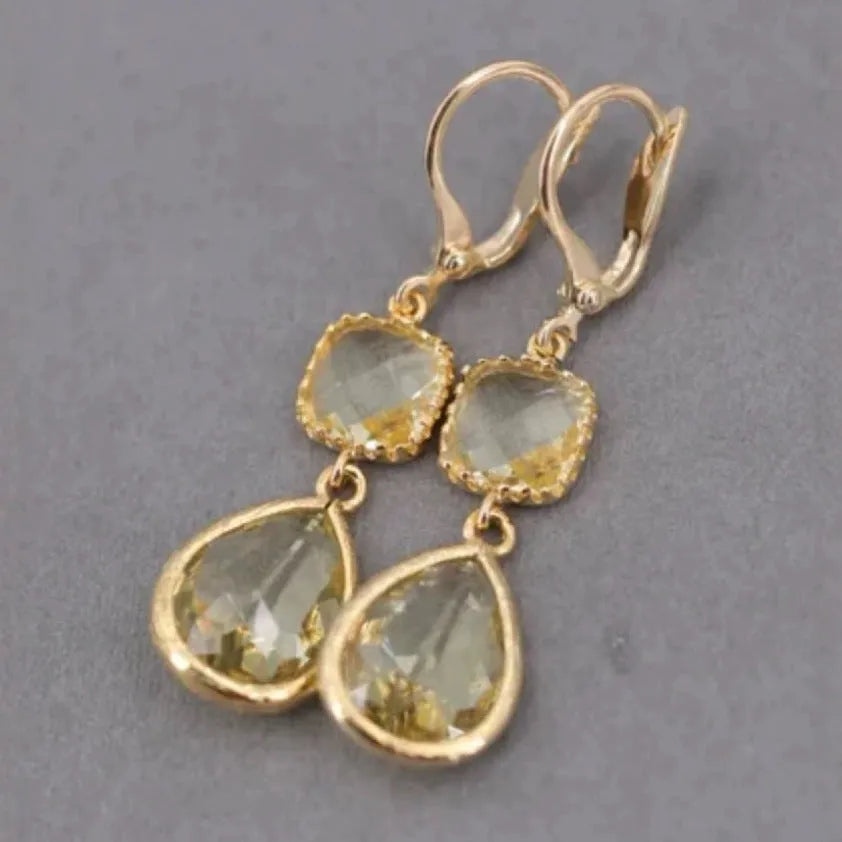 Gold geometric water droplet fringe earrings with retro exaggerated design on copper base