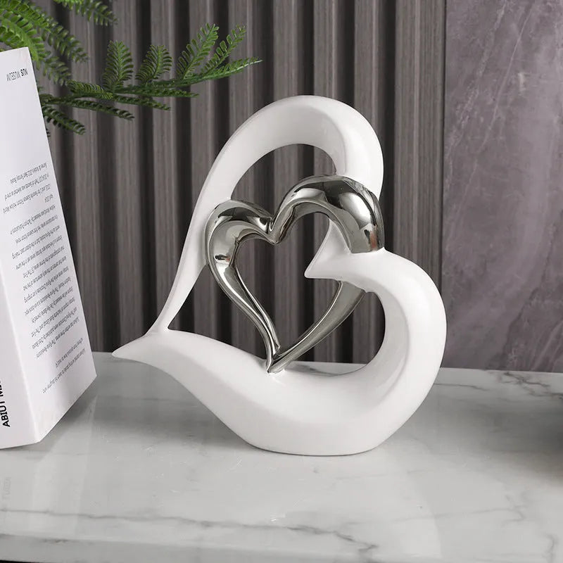 Modern white porcelain heart ornament with metallic finish in geometric design for living room or wine cabinet decoration