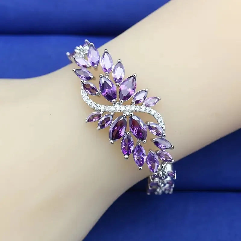Gold electroplated bracelet with colourful zircon stones and ice flower pattern detailing on copper base