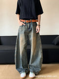 Men's retro blue distressed wide-leg jeans with micro-elastic cotton blend fabric showing distressed detailing