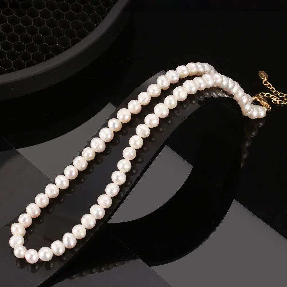Women's freshwater pearl necklace with adjustable sterling silver chain and 6-7mm natural pearls