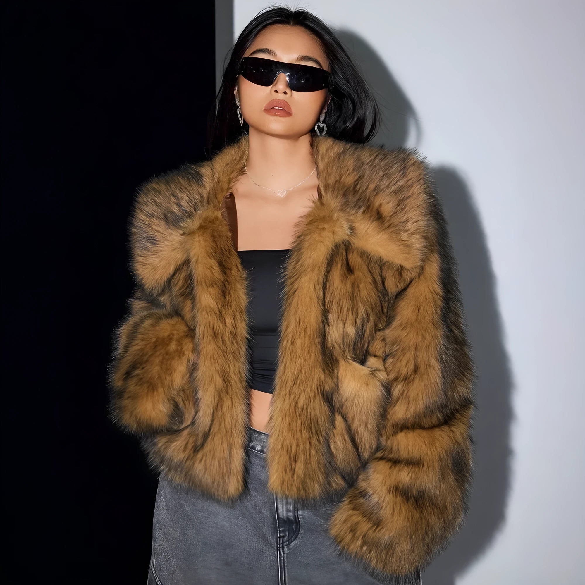 Artificial fur coat with fox fur style design in black tip colour variation