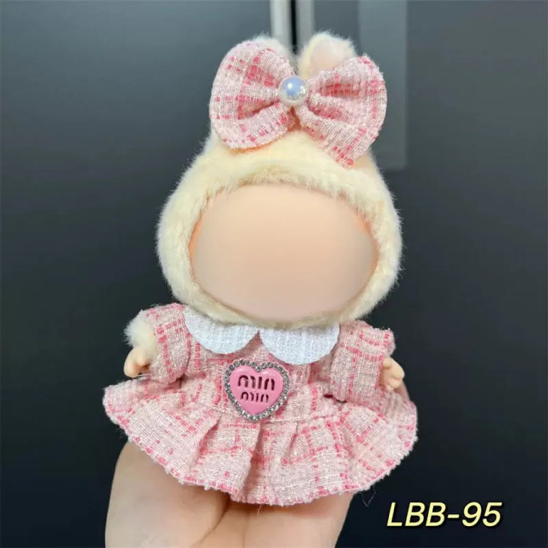 Plastic clothing outfit for a 17cm tall collectible vinyl figurine doll.