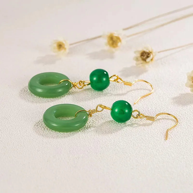 Green Chinese style peace buckle motif earrings with geometry shape and ring design elements