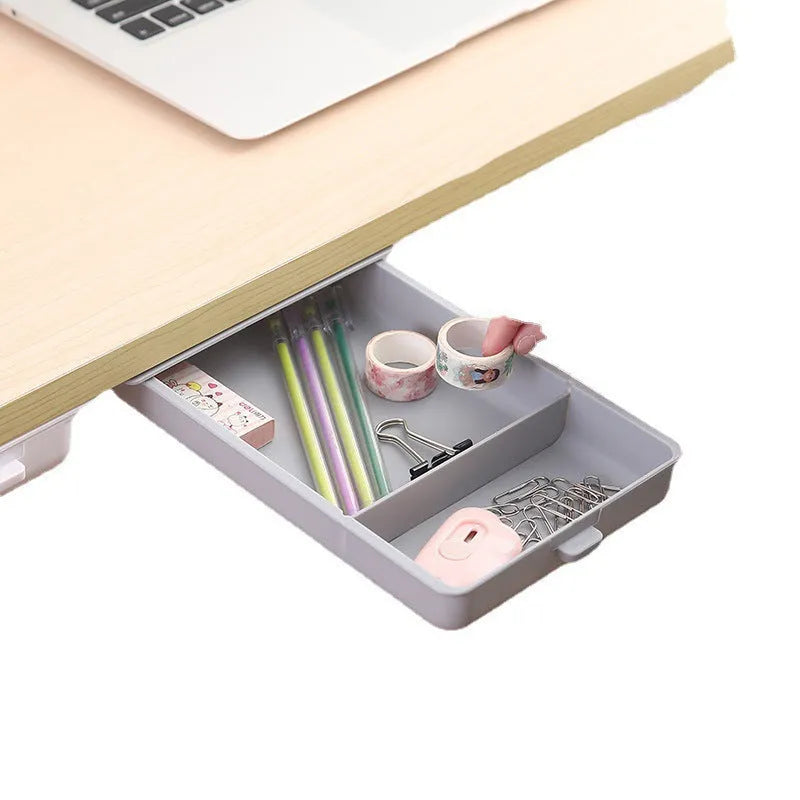 Plastic under-table storage drawer with lid open, showing internal grid, in choice of colours.