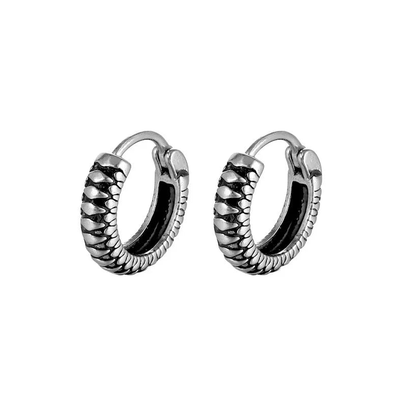 Silver geometric retro twist earrings made from titanium steel alloy with stripe detailing.