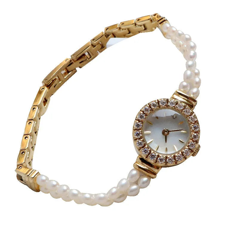 Women's light gold watch with freshwater pearl bracelet and round 18mm dial