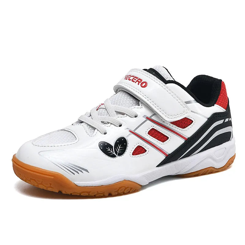 White and blue low-top badminton shoes with a ribbed sole and casual round-toe design on a court surface.