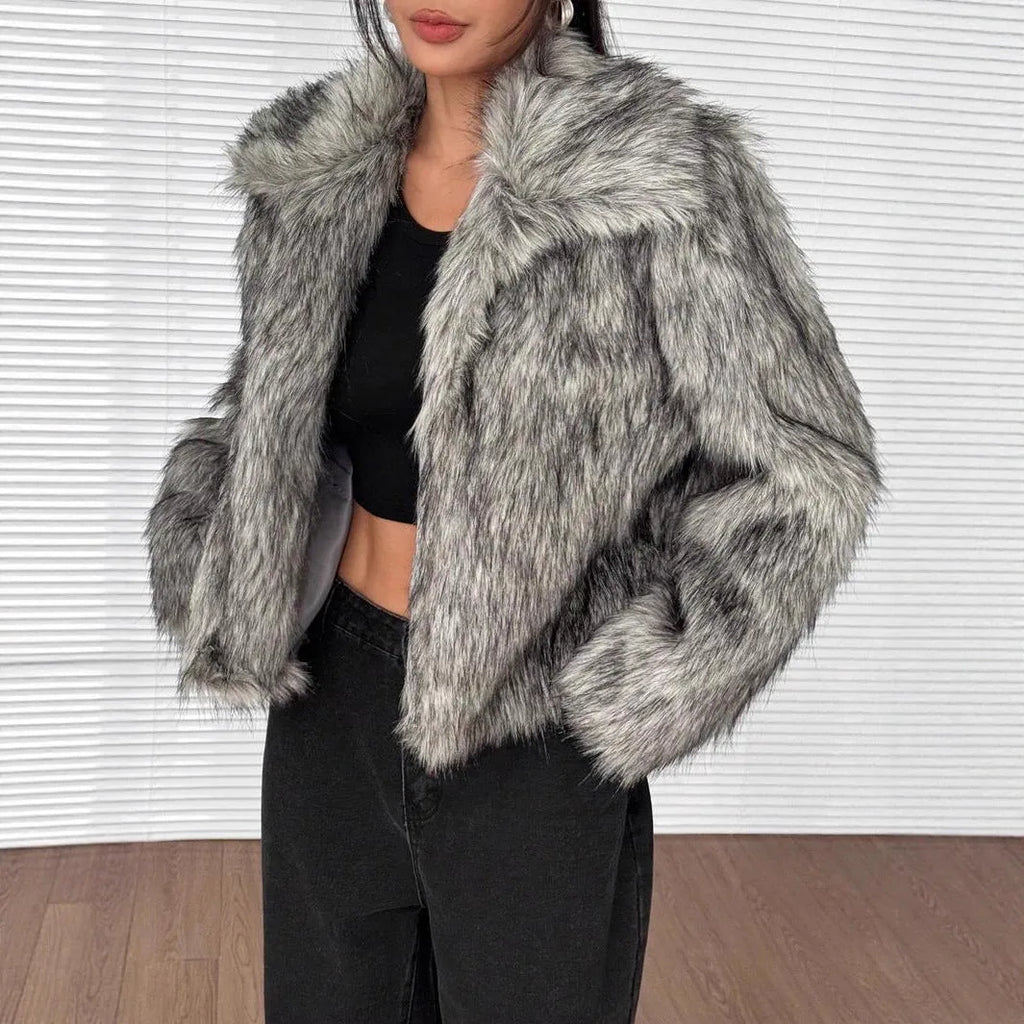 Artificial fur coat with fox fur style design in black tip colour variation