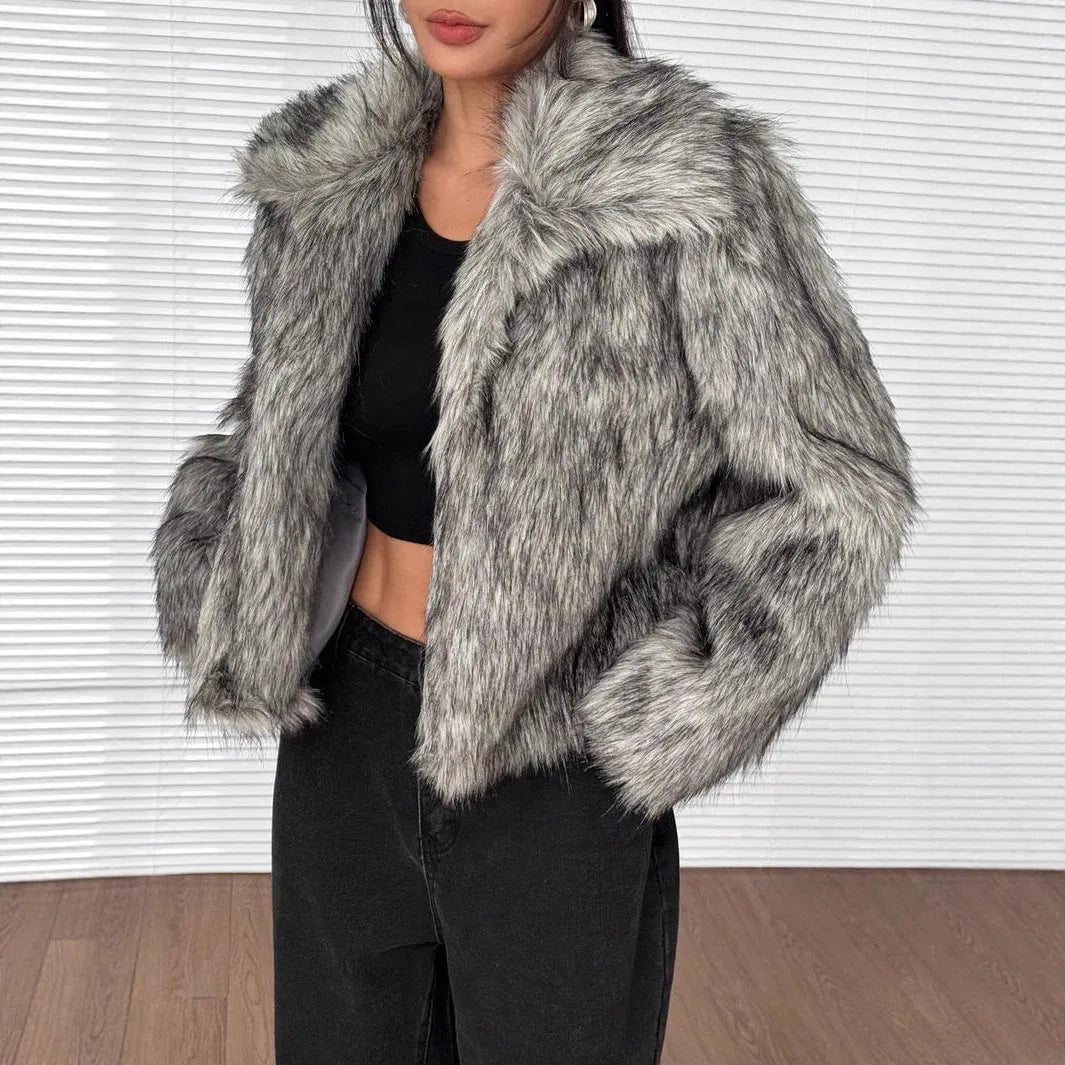 Artificial fur coat with fox fur style design in black tip colour variation