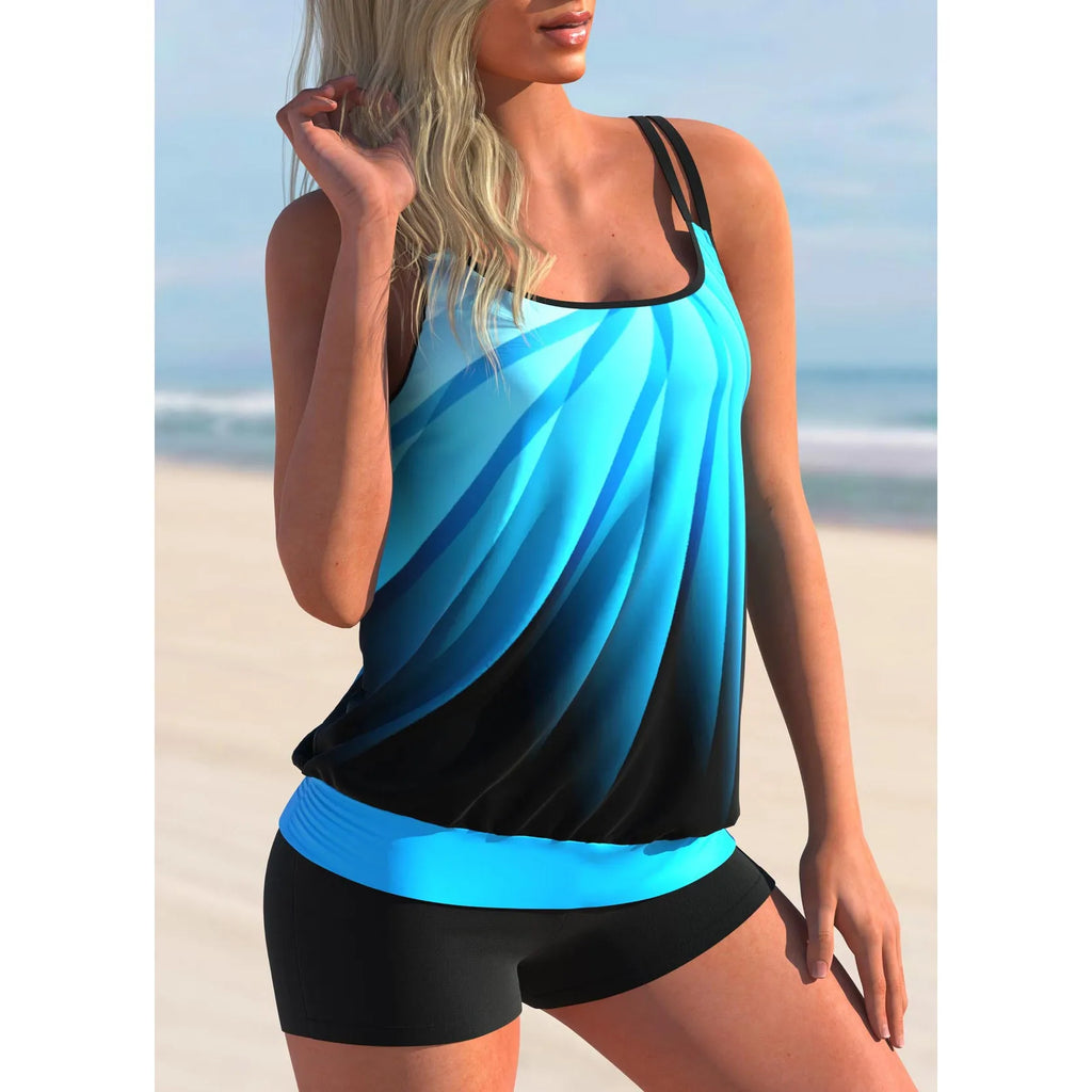 Women's plus size butterfly print swimsuit set with strappy top and matching beach shorts.