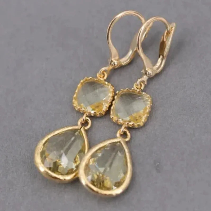 Gold geometric water droplet fringe earrings with retro exaggerated design on copper base