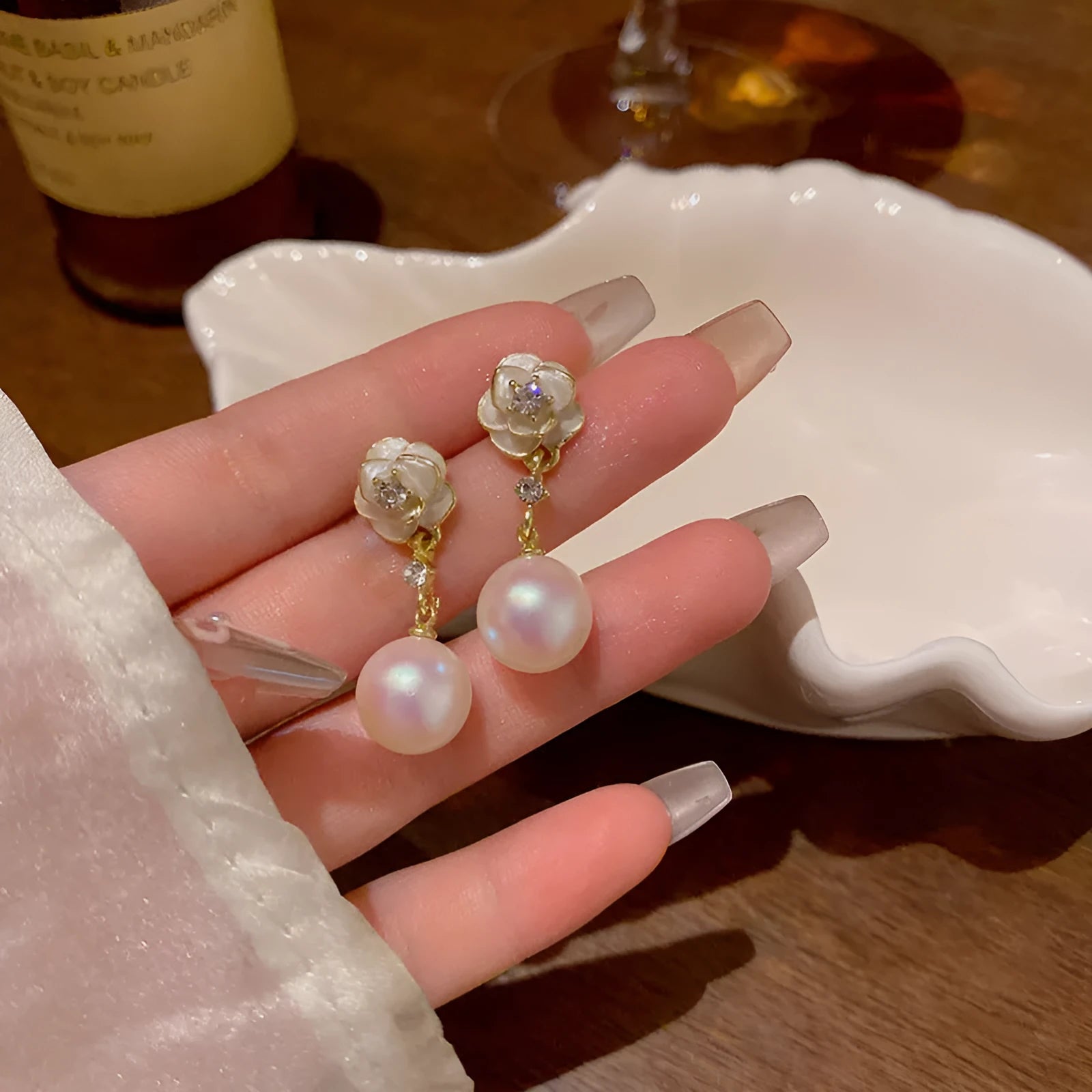 Camellia flower-shaped stud earrings in alloy with floral detailing