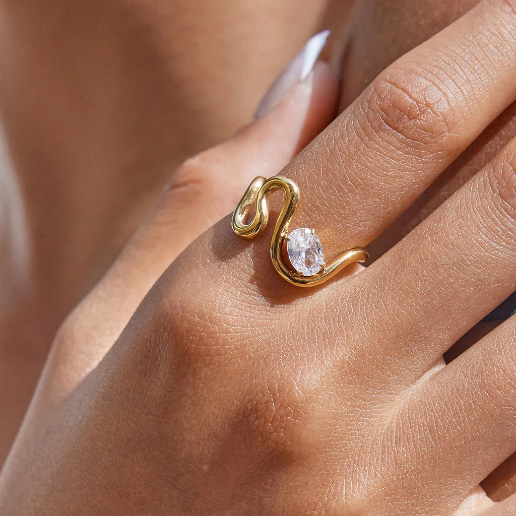 Men's geometric titanium steel zircon ring on a hand, showing no-fading stainless steel construction.