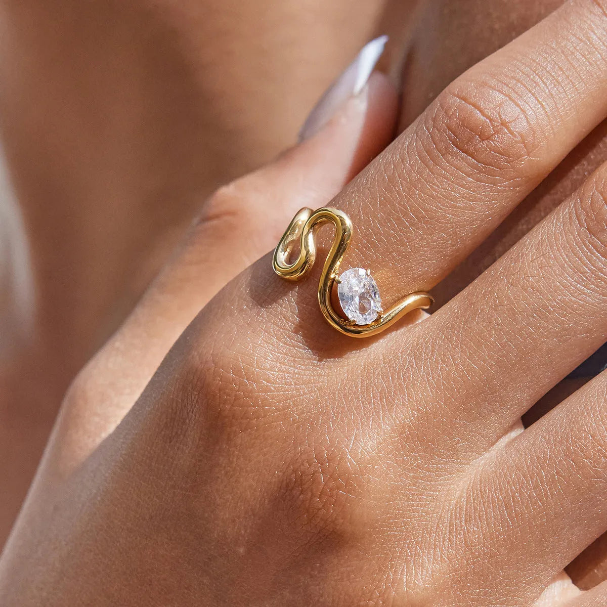 Men's geometric titanium steel zircon ring on a hand, showing no-fading stainless steel construction.