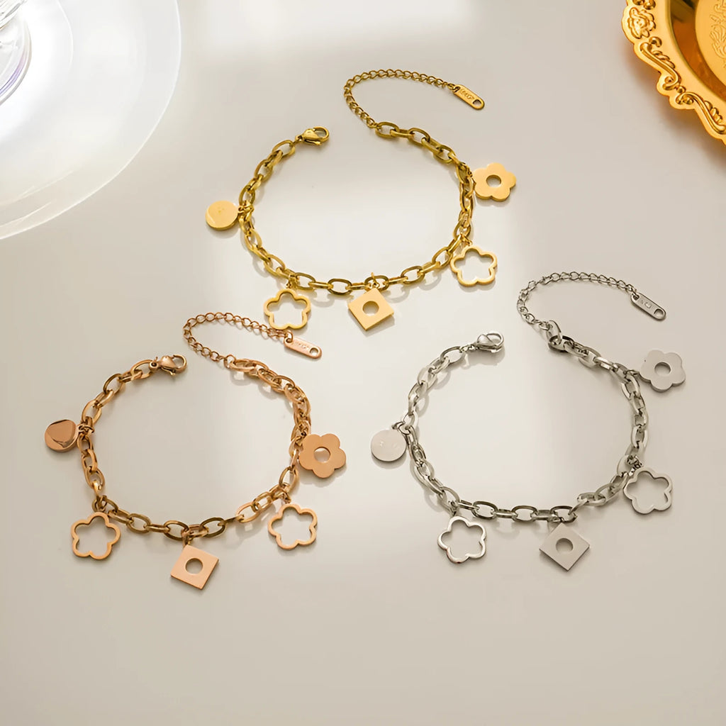 Titanium steel flower small pendant bracelet for women in gold electroplated finish