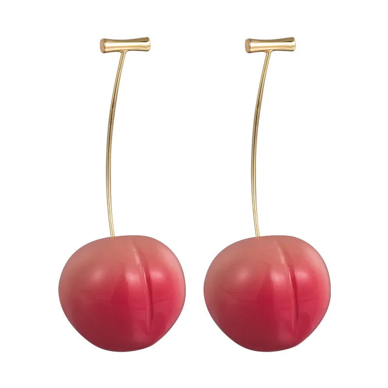 Juicy Peach fruit-shaped acrylic earrings on copper posts, shown in small and large size variants.