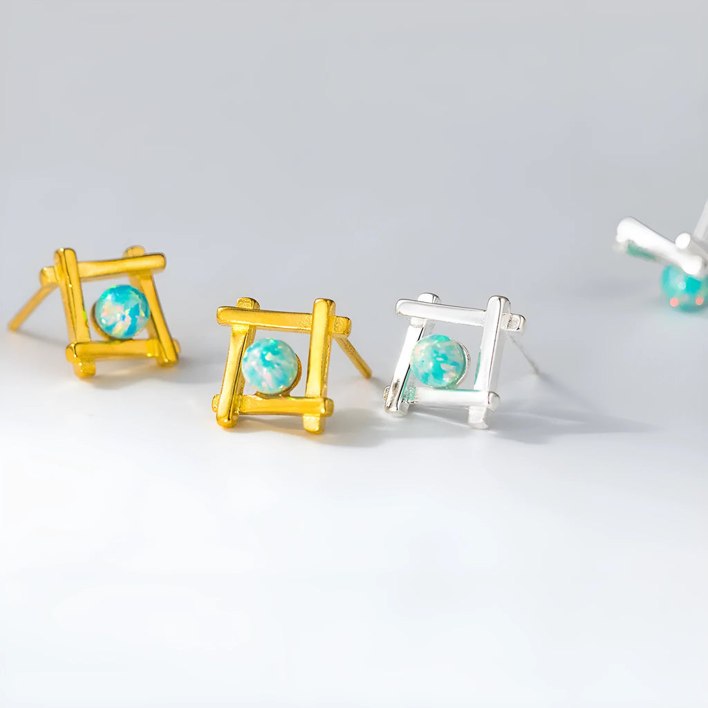 Women's geometric cross quadrangle stud earrings in S925 silver available in silver and gold tones