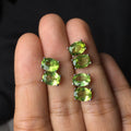 Grass green natural olivine oval stone stud earrings in S925 sterling silver.
