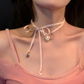 Women's alloy necklace with ribbon love pendant and electroplated finish on clavicle chain