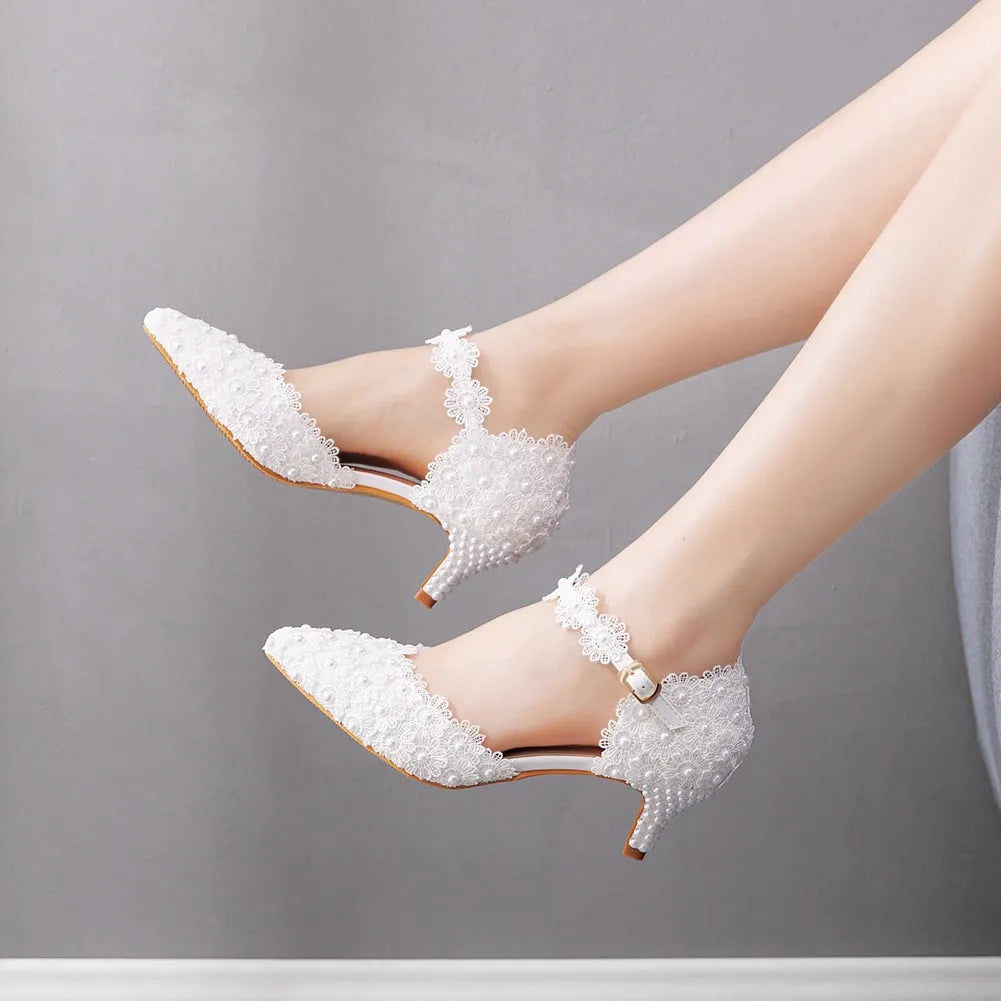 Pointed toe low heel sandals for women in white artificial PU with stiletto heel, side view