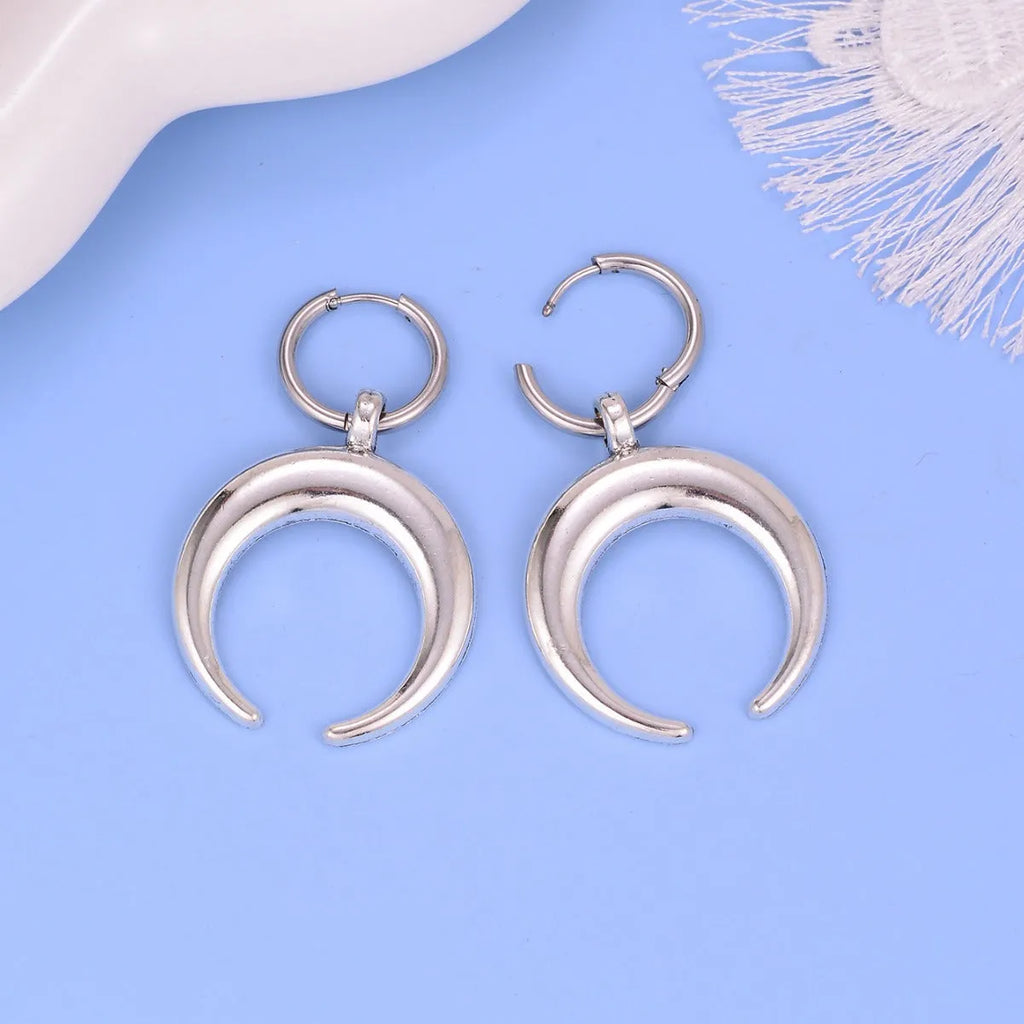 Silver geometric moon big hoop earrings with gothic punk style and ear clip fastening