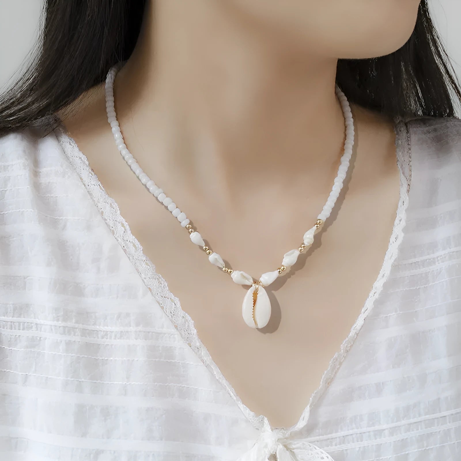 White conch shell bead necklace with mother pearl pendant on regular chain, electroplated finish