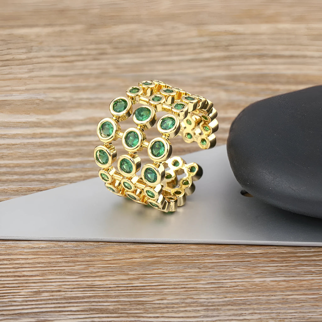 Copper 18K gold plated three-layer ring with green zircon stones in wide band unisex design