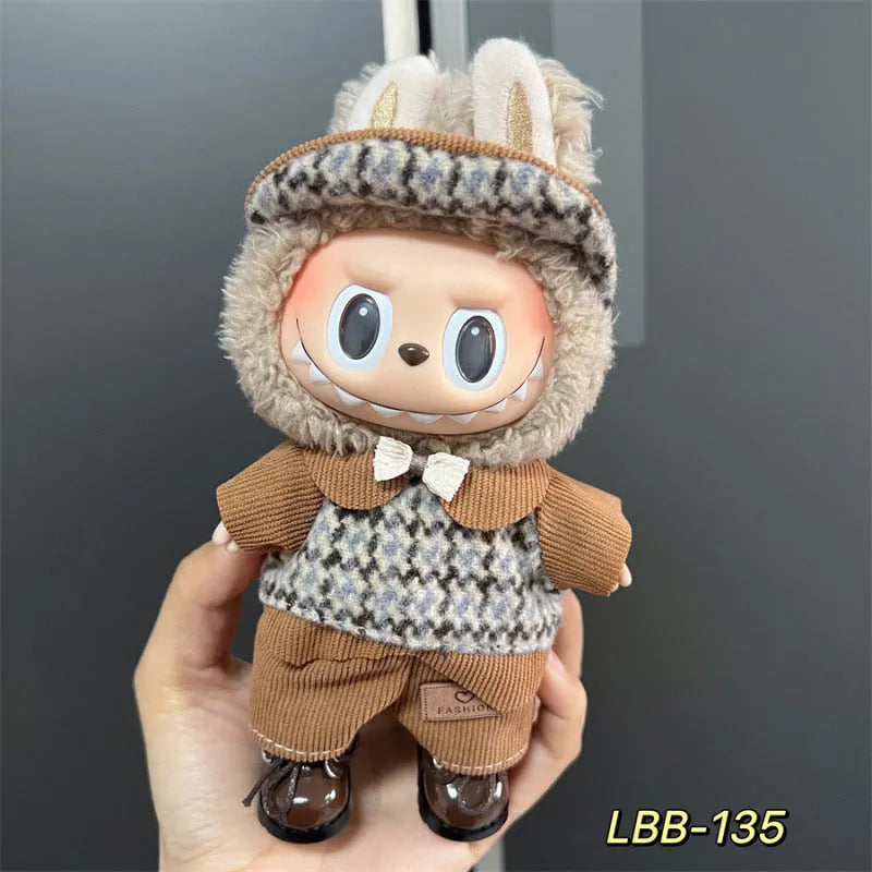 Plastic clothing outfit for a 17cm tall collectible vinyl figurine doll.
