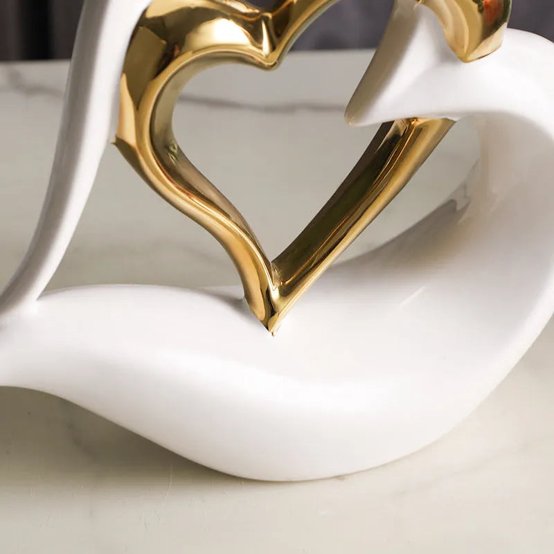 Modern white porcelain heart ornament with metallic finish in geometric design for living room or wine cabinet decoration