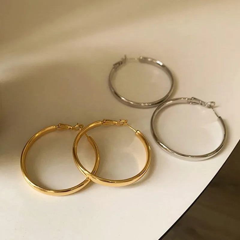 40mm circular copper earrings with electroplated gold or silver finish