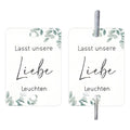 Pack of 50 white decorative paper labels with a red and gold fireworks design for celebrations.