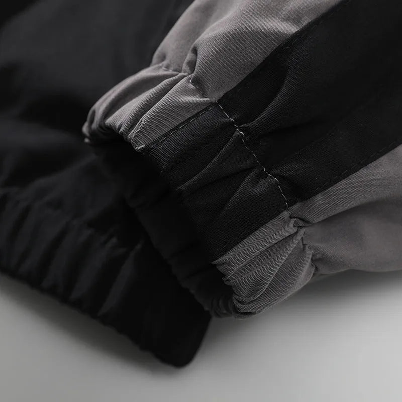 Men's black casual jacket with contrasting colour stitching on the front and sleeves.