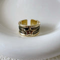Adjustable retro-style geometric copper ring with line detailing and electroplated finish.