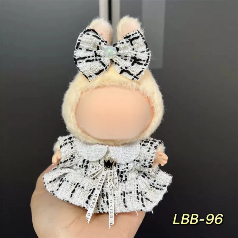Plastic clothing outfit for a 17cm tall collectible vinyl figurine doll.
