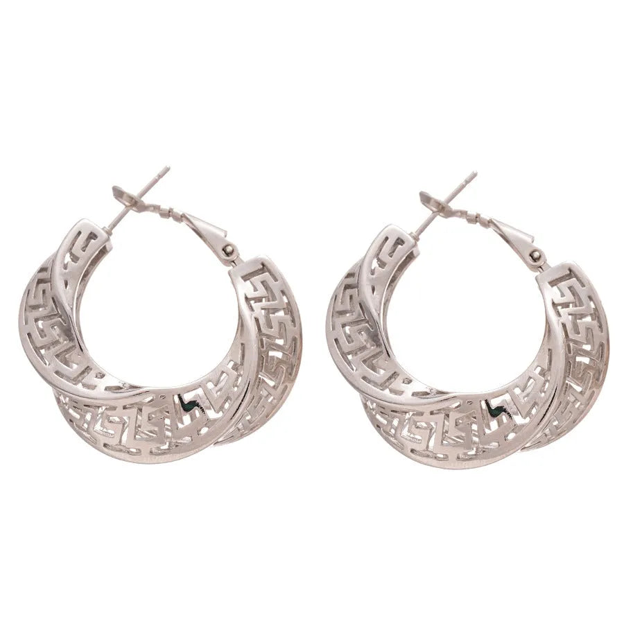 Geometric round hollow stud earrings for women with a twisted design in gold or silver finish.