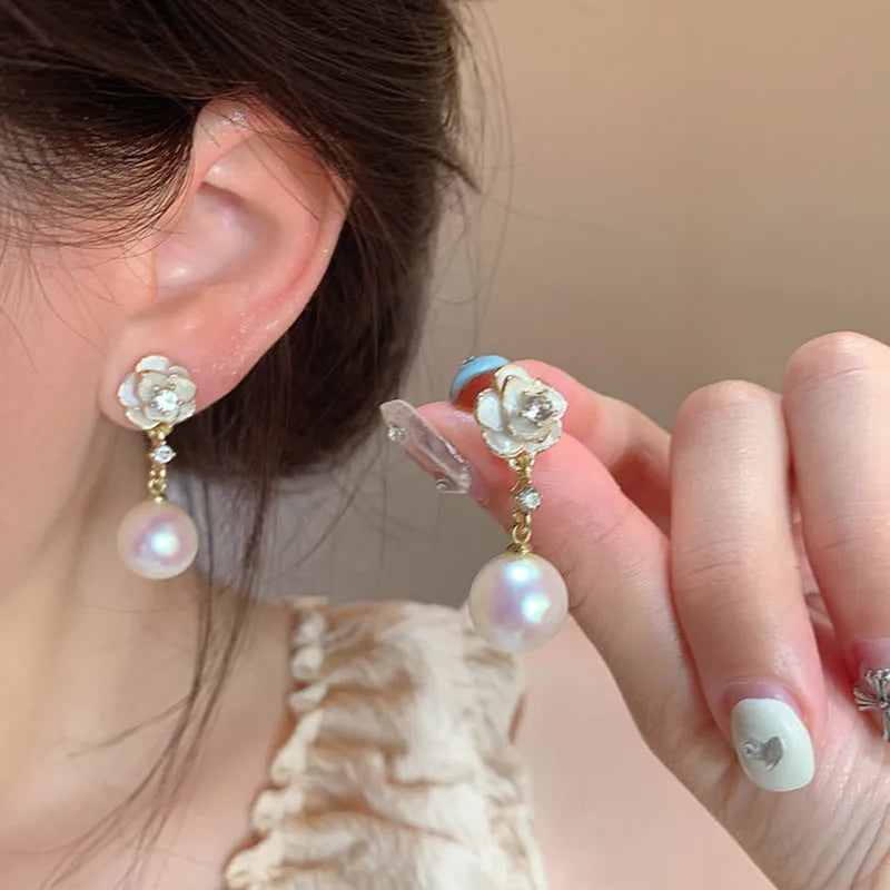 Camellia flower-shaped stud earrings in alloy with floral detailing