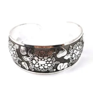 Ethnic carved open Miao silver alloy bracelet with Roman styling in turtle colour finish