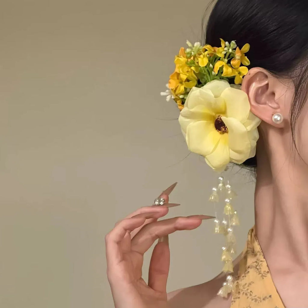 Yellow and purple floral tassel hair clip accessory with side attachment