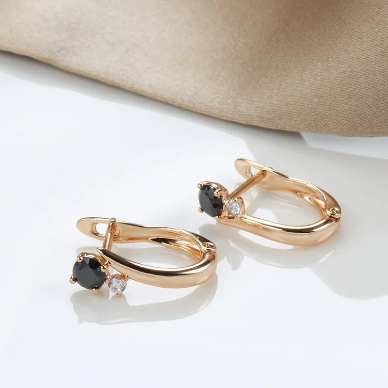 Women's gold-colour drop earrings with black agate geometric design and retro styling on ear clips