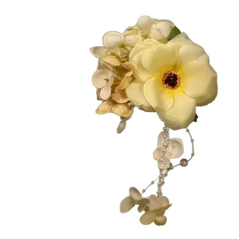 Yellow and purple floral tassel hair clip accessory with side attachment