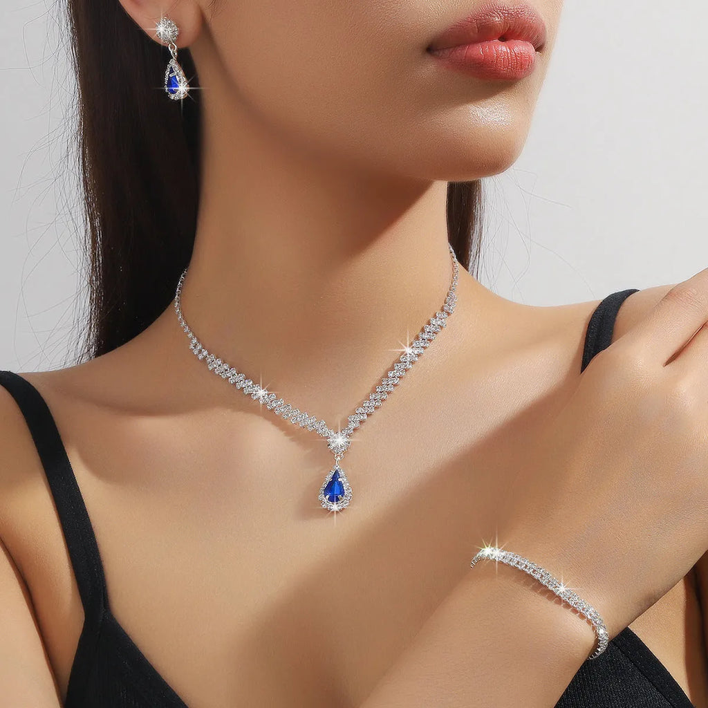 Women's claw chain necklace and earrings set with drop-shaped rhinestone pendants