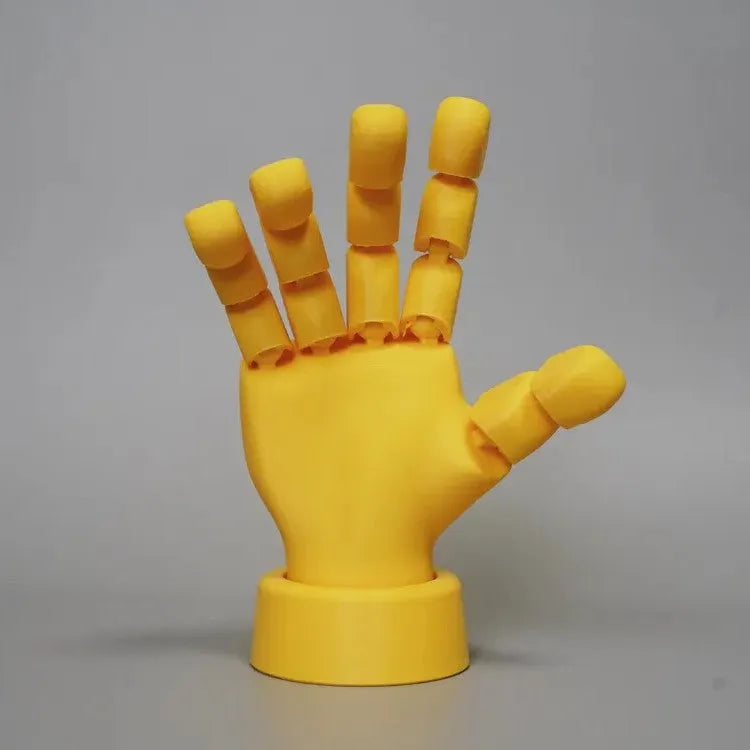 Yellow PLA movable joint hand props for stop motion animation measuring 5x5.38x7.5cm