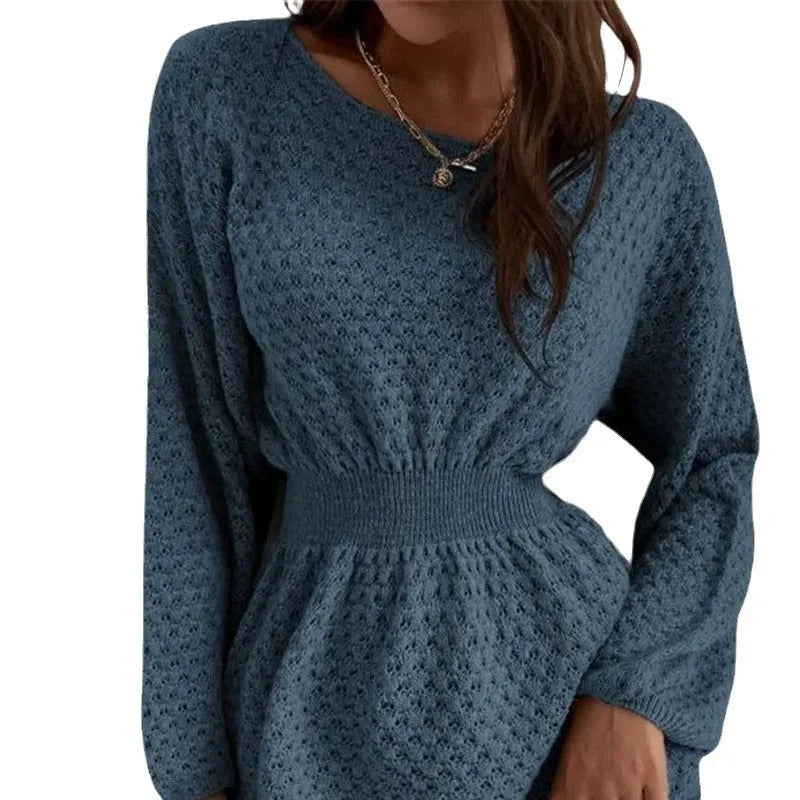 Blue women's knitted dress with hand-crocheted flowers, fitted waist, and round neckline