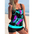Women's plus size butterfly print swimsuit set with strappy top and matching beach shorts.