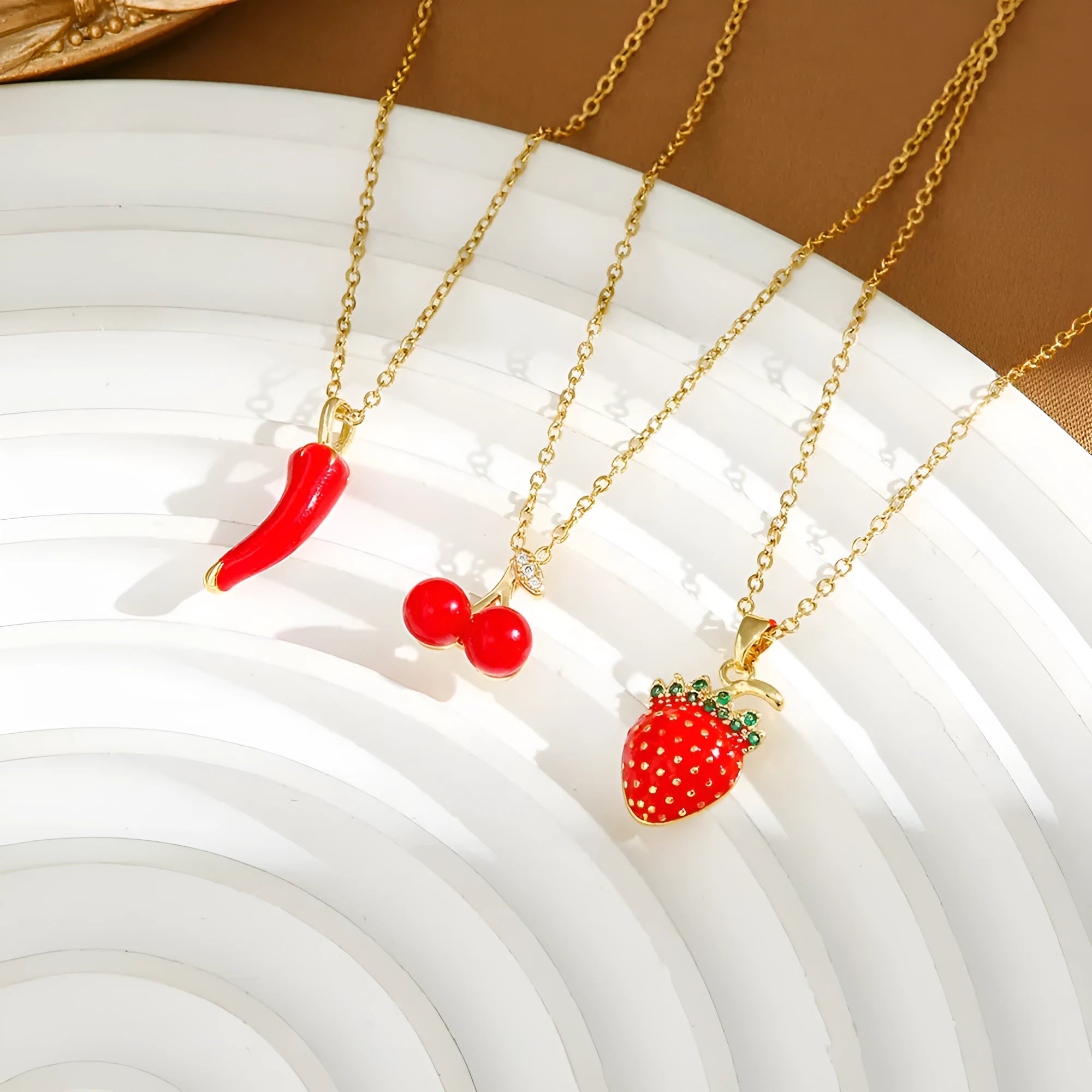 Titanium steel women's necklace with fruit pendant on O-ring chain in golden and steel colour options