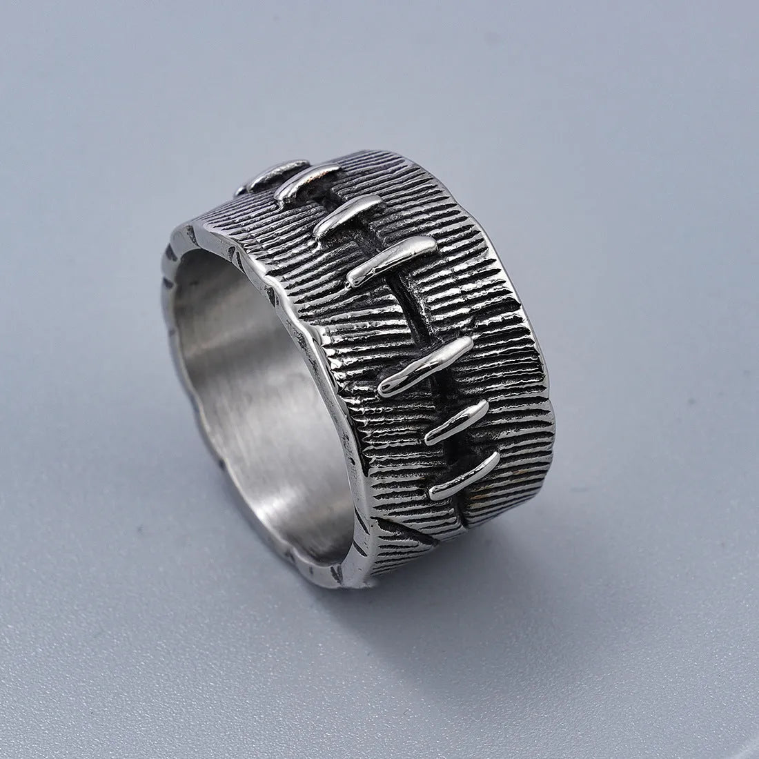 Dark punk stitched titanium steel ring with double U-shaped geometric design in retro colour