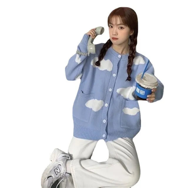 Women's blue cloud pattern cardigan sweater with loose fit and long sleeves