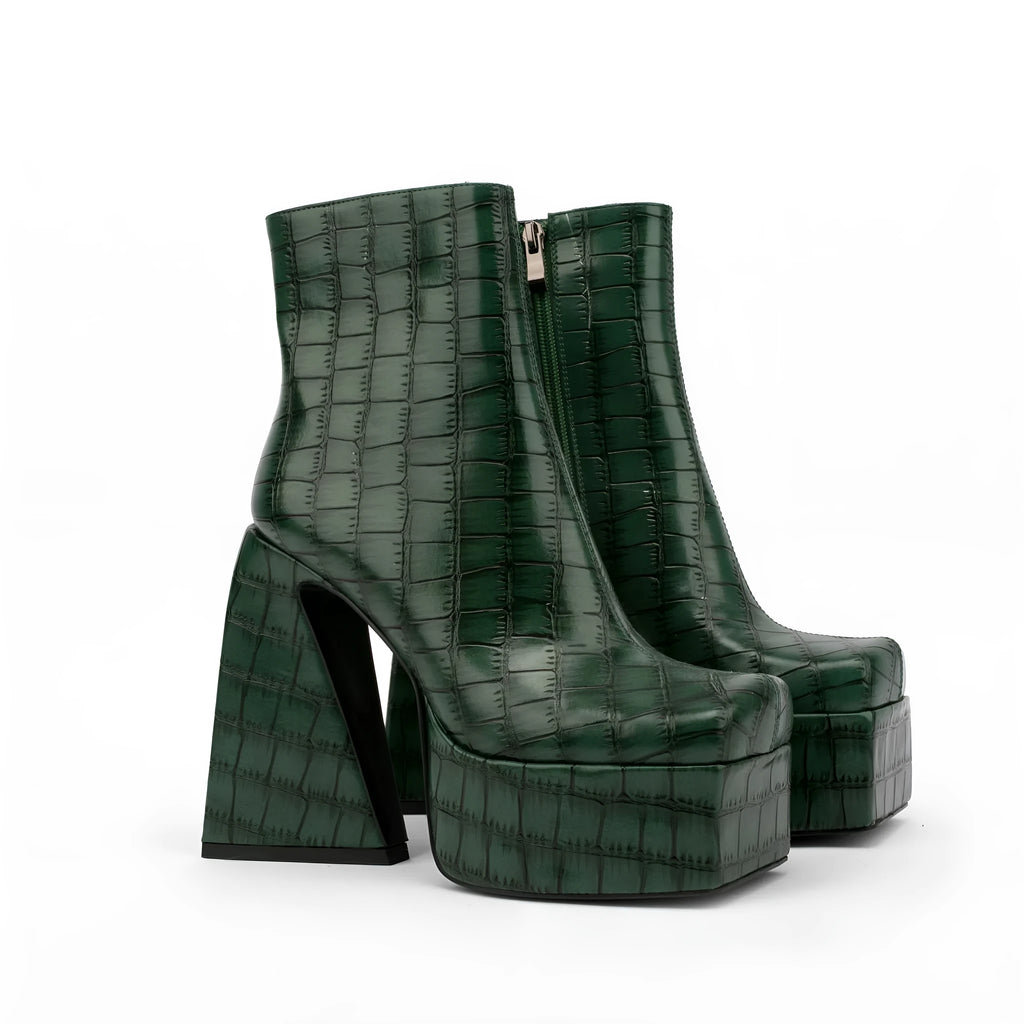 Women's ankle boots with a super high heel in artificial PU, shown in beige colour.