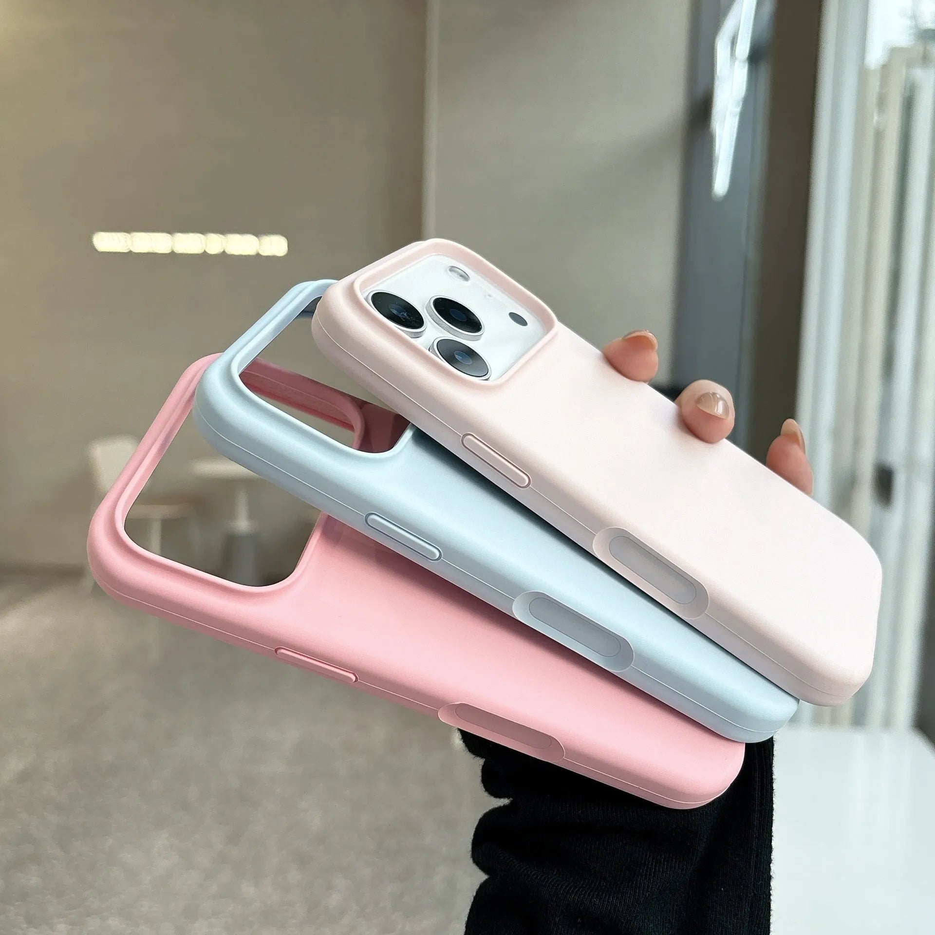 Liquid silicone magnetic charging phone case with Ai button for iPhone, shown in antique white colour.